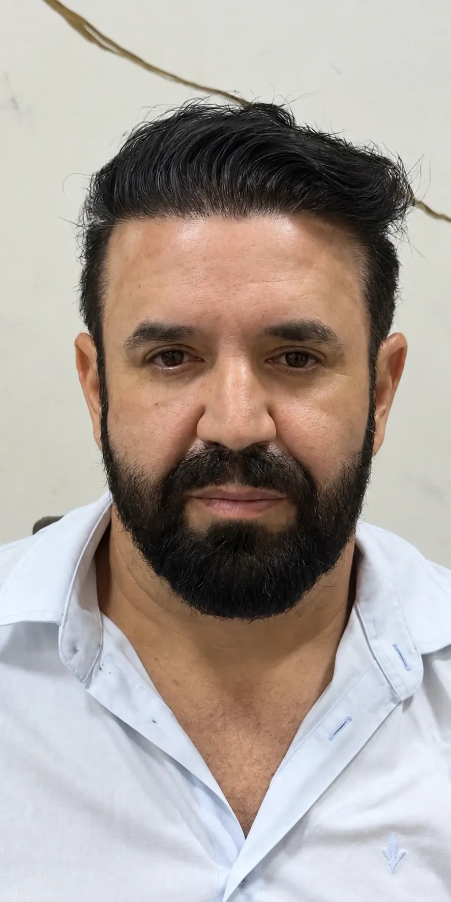 O mesmo cliente após o corte definido pela análise visagista